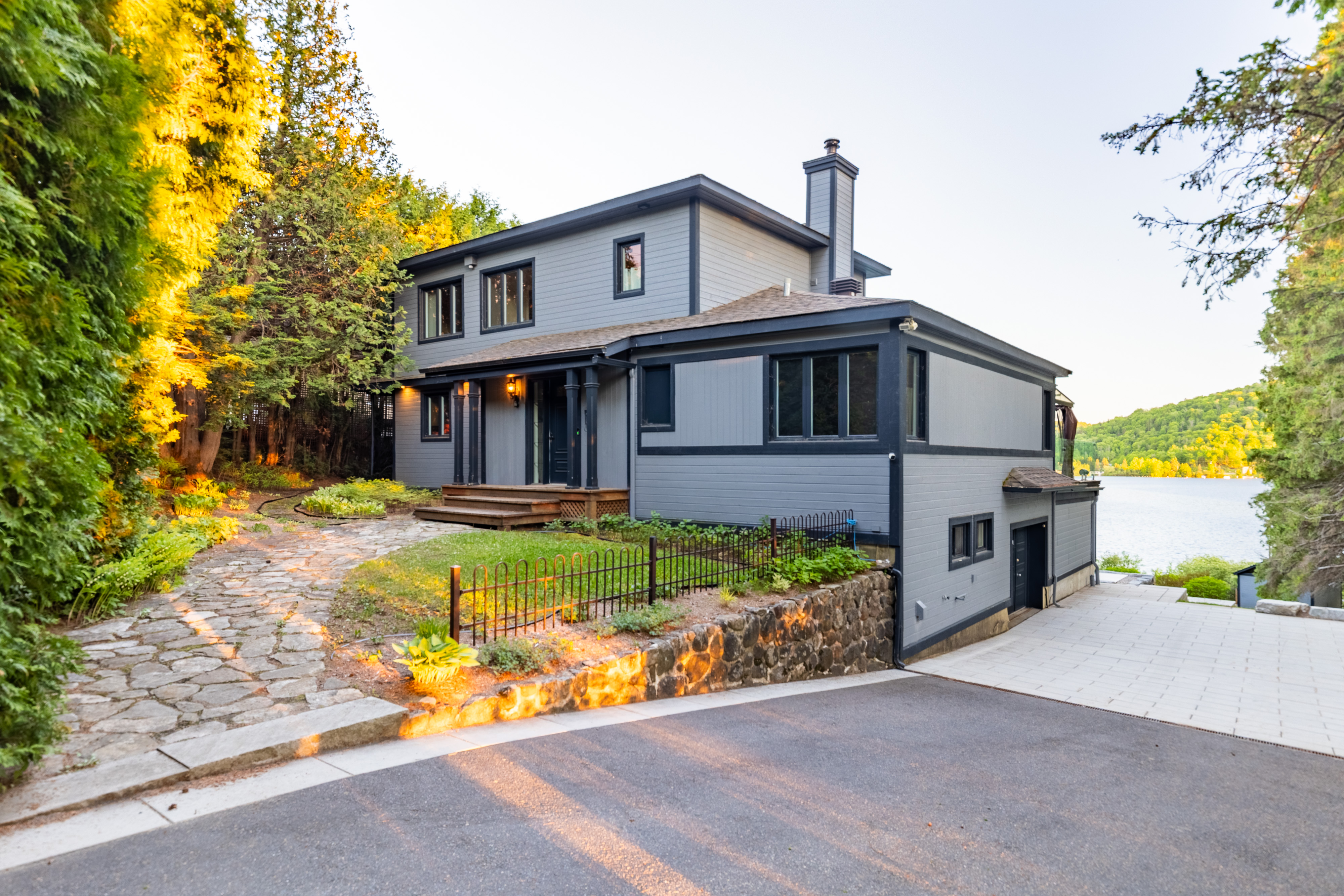Lakeside residence surrounded by mature trees